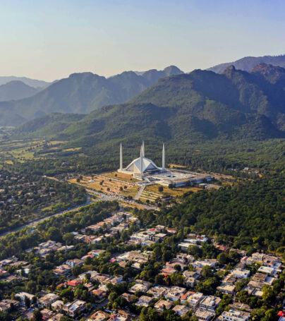 Shah Faisal mosque is the masjid in Islamabad, Pakistan. Located on the foothills of Margalla Hills. The largest mosque design of Islamic architecture, Mosque Drone Footage